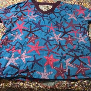 Women’s scrub top multi colored with starfish